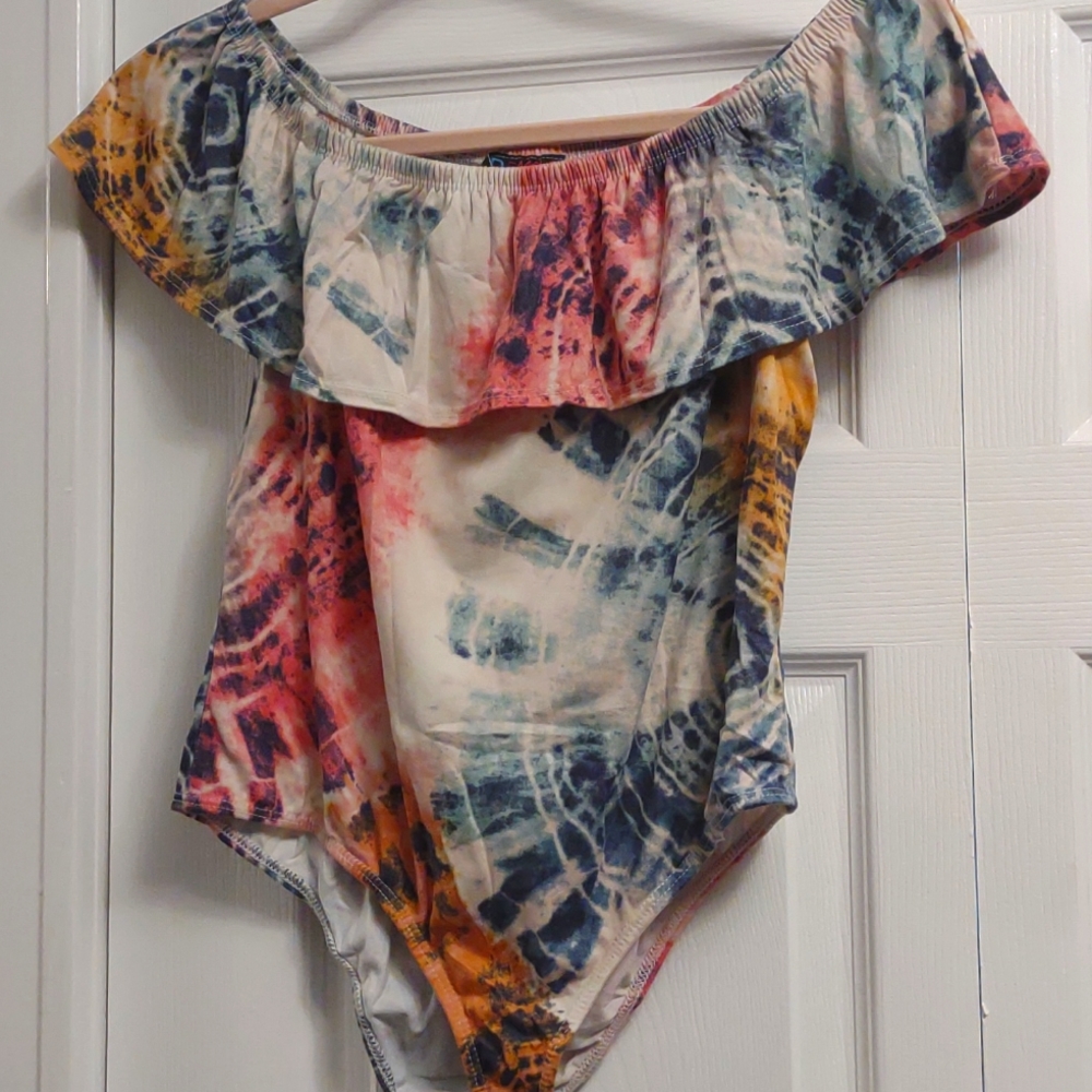 Never worn. Sz XL bodysuit